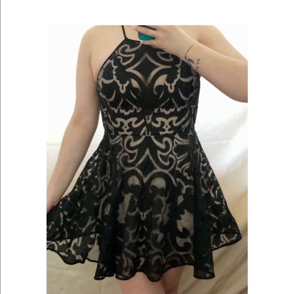 Women’s black/beige formal dress.